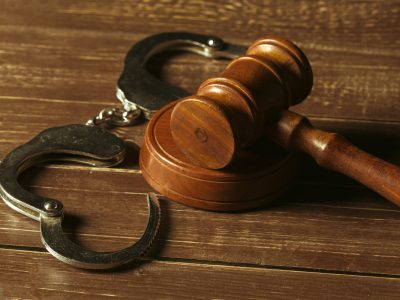 Close-up view of brown wooden mallet of judge